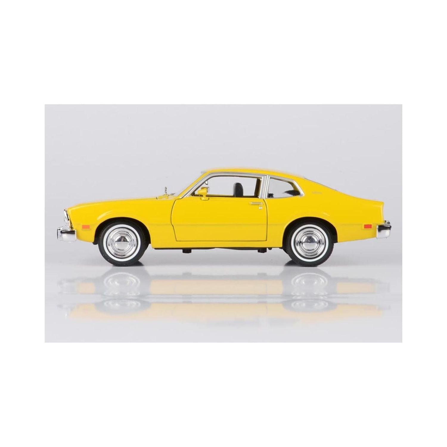 Motormax 1974 Ford Maverick Yellow "Forgotten Classics" Series Scale 1:24 Diecast Model Car